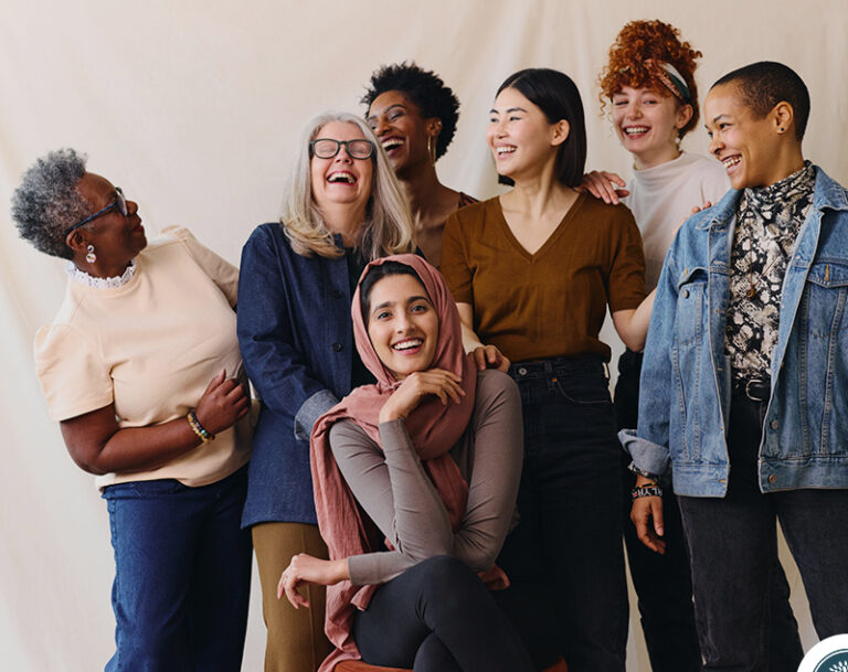 Smiling group of adults standing together